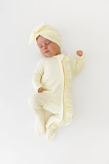 Ribbed Ruffle Zipper Footie in Chamomile
